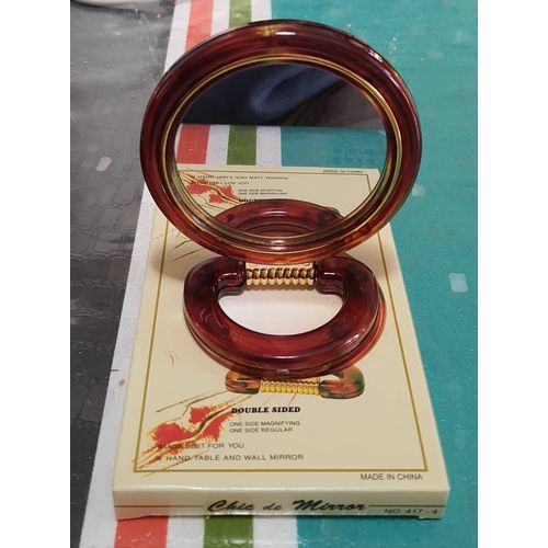 Miroir de voyage double face