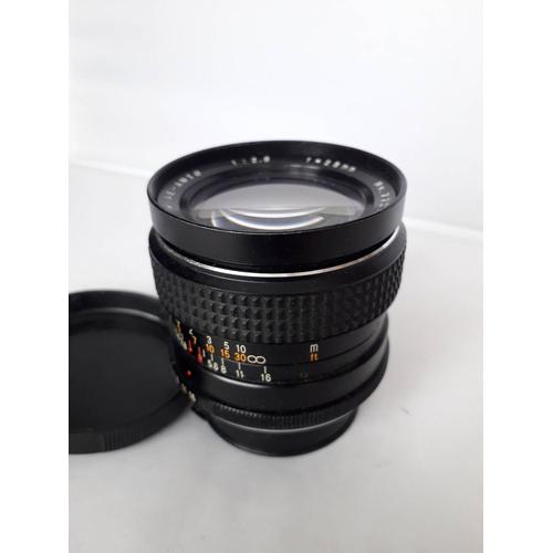 OBJECTIF TOKINA RMC 28mm F2.8 monture MINOLTA MD