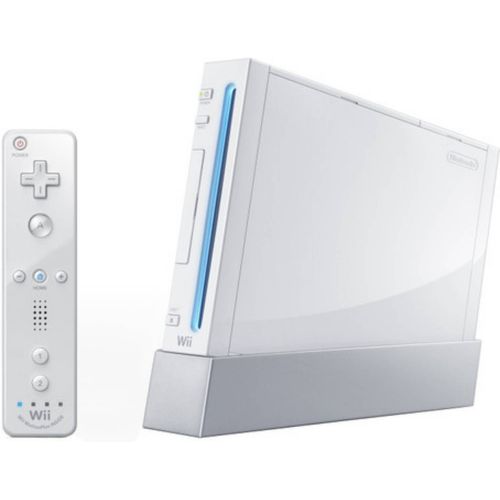 Nintendo Wii + Jeu Mario Galaxy + Jeu Beyblade + Jeu Epic Mickey + Jeu Mario Party 8 + Jeu Mario Kart