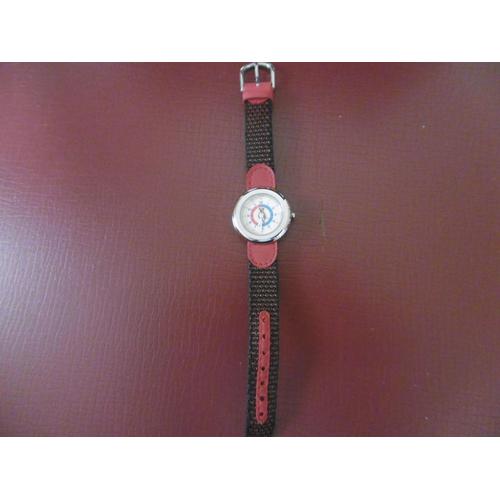 Montre Enfant Mixte Affichage Analogique Quartz Cadran Chromé Fond Beige Avec Ourson Bracelet Tissu Noir Et Rouge Dauteuil C040a03