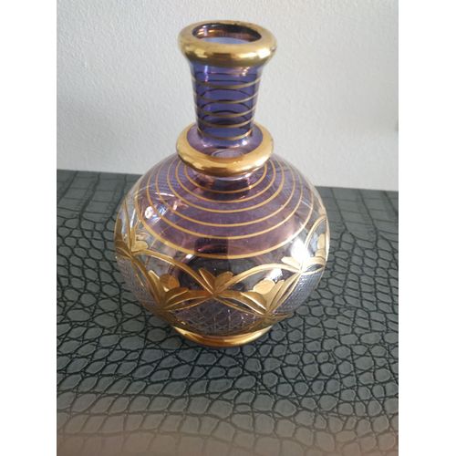 vase ciselé et doré