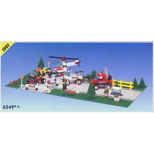 Lego Ville Policier 6549 Roadblock Runners Ensemble Routier Avec 2 Plaques, Hélicoptère, Voiture De Police, Camions Et 4 Figurines