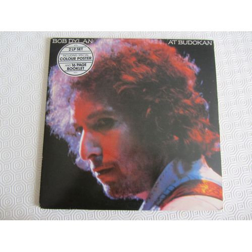 At Budokan (Live) : Mr. Tambourine Man - Shelter From The Storm - Maggie's Farm - Like A Rolling Stone - Oh Sister - Knockin' On Heaven's Door - Etc...