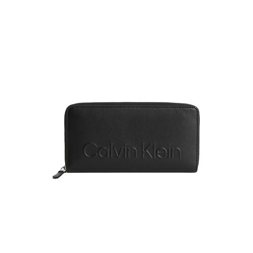 Portefeuille Calvin Klein Zippe logo relief Femme Noir