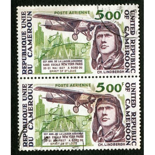 Deux Timbres Oblitérés République Unie Du Cameroun, Poste Aérienne, 500 F, 50e Ann. De La Liaison Aérienne Sans Escale New York-Paris 20-21 Mai 1927 À Bord Du Spirit Of St Louis