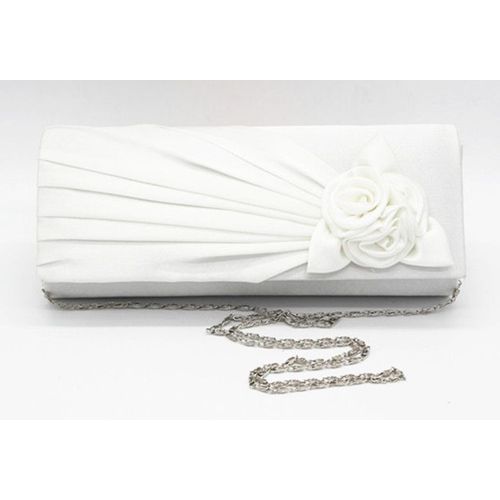 Mariée main tenant sac rose fleur soie banquet sac blanc