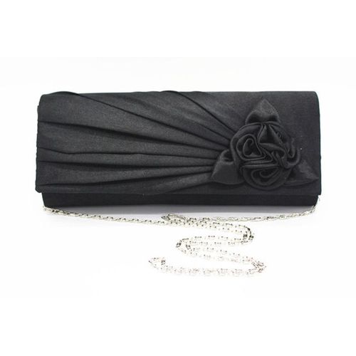 Mariée main tenant sac rose fleur soie banquet sac noir