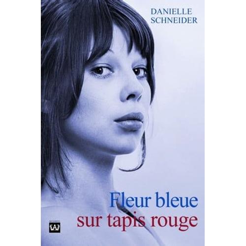 Fleur Bleue Sur Tapis Rouge