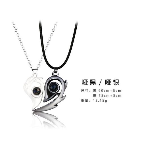 Les Aimants Attirent 100 Langues Je T'aime Conception De Niche Collier De Projection Paire De Pendentifs Couple Amoureux - Combinaison Noir + Argent (Corde Noire + Chaîne En Argent)