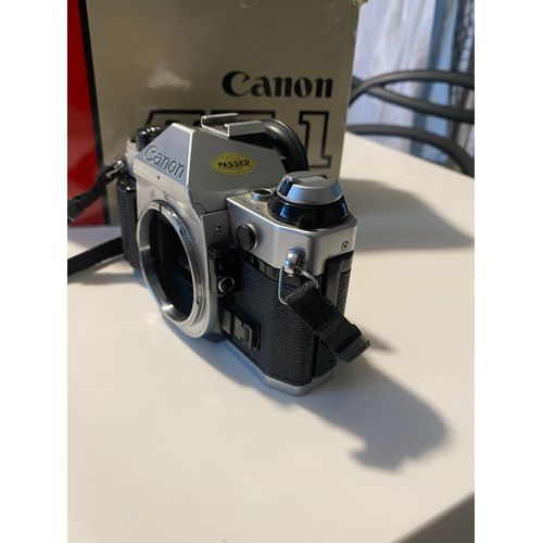 CANON AE 1 PROGRAM AVEC OBJECTIF 35x75mm OZUNON