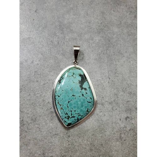 Pendentif En Turquoise Du Mexique Cerclé D'argent