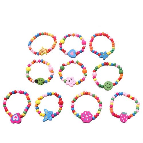 10pcs Bois Naturel Enfants ¿¿Lastiques Perles En Bois Bracelets Enfants Filles Cadeau De F¿ºte (Couleur Al¿¿Atoire)