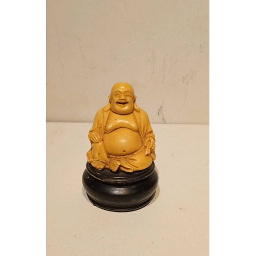 Petit bouddha 8 cm résine couleur ivoire et noire