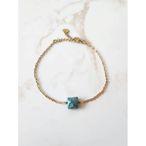 Bracelet Doré En Acier Inoxydable Avec Une Pierre Bleue
