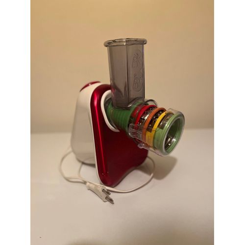 Moulinex rap électrique.Utiliser quelques fois, fonctionne très bien.Le socle pour tenir est cassé voir photo.Peux Rapée : du fromage,des légumes etc…