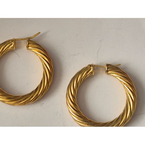 Boucles D'oreilles Créoles En Argent.