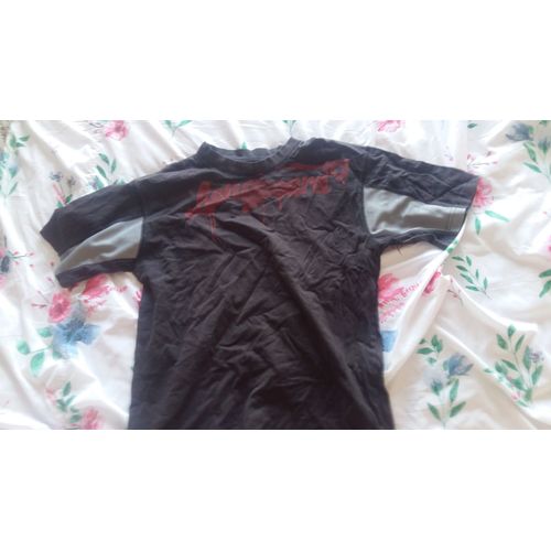 Polo Garçon Marron Avec Logo Rouge Taille S