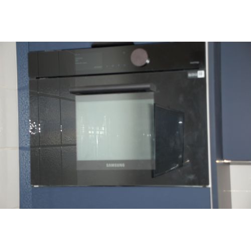 four combiné samsung ref NQ50T8539BK