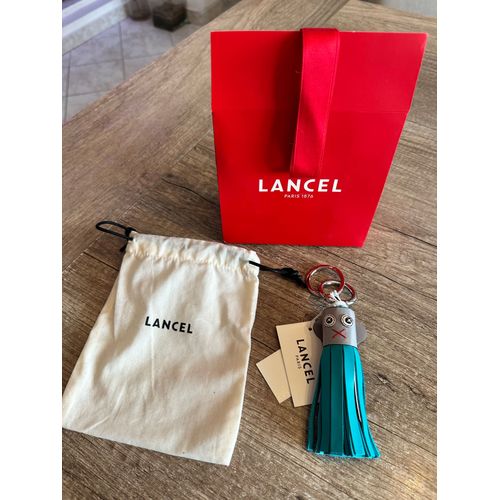 Bijou de sac pompon & porte-clé Lancel