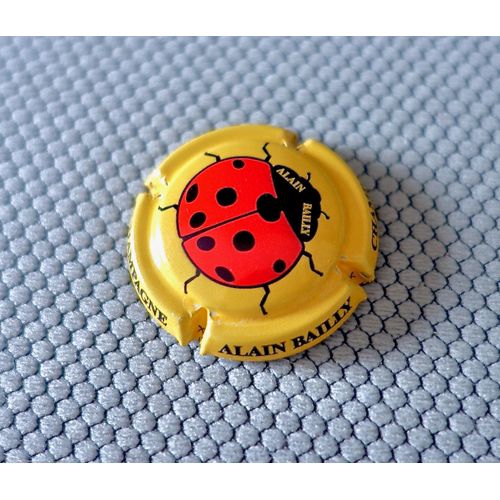 Capsule Champagne Alain Bailly . Coccinelle. Tour Jaune
