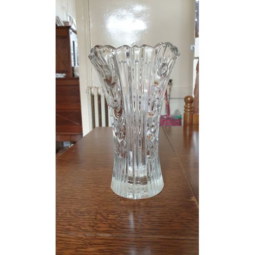 Vase cristal « assez lourd ».