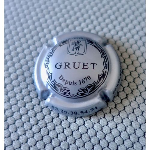 Capsule De Champagne Gruet. Gris Argent Et Noir, Verso Argent