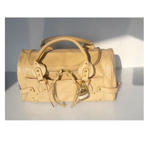 Sac A Main Chloé Mode long forme tubulaire ouvert par le milieu zip Tendance Beige Ecru Rehaussé de Ferrures Dorées Pratique Elegant Besace Bagage Handbag Sans Accessoire Chloé