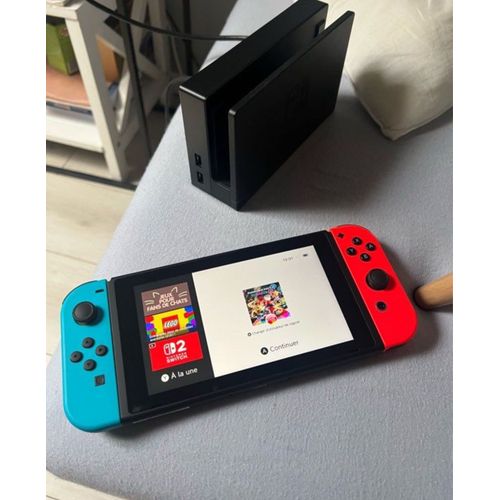 Nintendo Switch + Packs Sport + Mario Kart ( Équipements Compris)