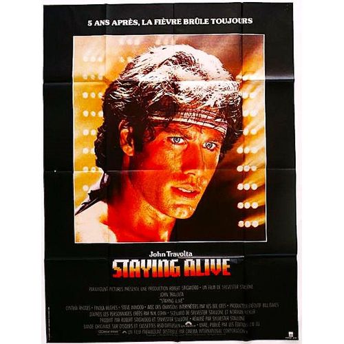 *** Staying Alive De Sylvester Stallone - 1983 - John Travolta - Affiche Cinéma Originale - 120 X 160 ( Affichée Minime Trous Sur Le Haut ) - Très Bon Etat ***