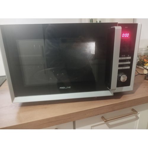 Four micro-ondes combiné grill Proline