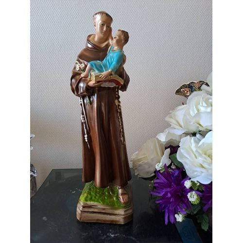 Statue Saint Antoine de Padoue signé en céramique. 41 cm.