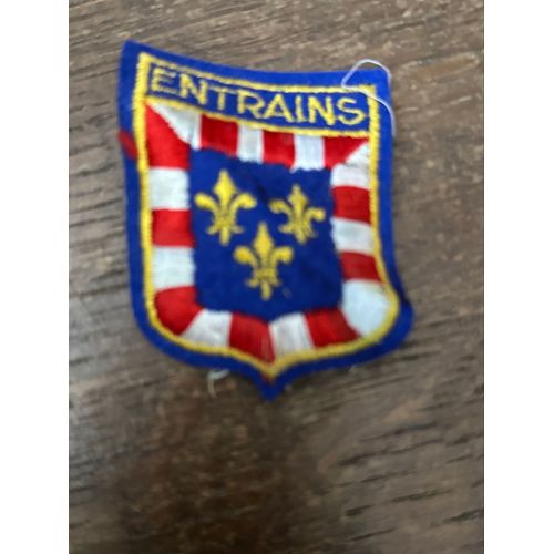 Écussons Entrains 