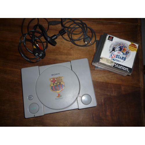 Playstation 1 + 4 Jeux