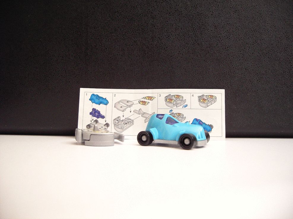 Kinder (Autos) : La Figurine + Son Bpz - Série : Rennwagen Mit Katapult (2003) / Voiture De Course Avec Catapulte - K04 N. 74 / K04n74 : La Voiture De Course Bleue + Sa Catapulte + Son Bpz