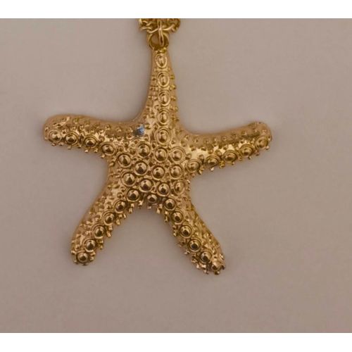 Pendentif En Forme D' Étoile Doré Avec Sa Chaîne
