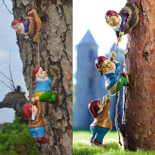 Sculpture d'arbre d'escalade de gnome d'elfe de bande dessinée