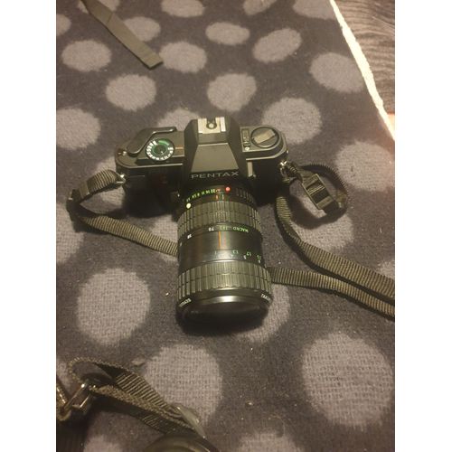 Vend pentax P30 tres bin etat avec son étuis