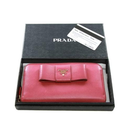 Portefeuille Prada avec boite et carte d authenticité