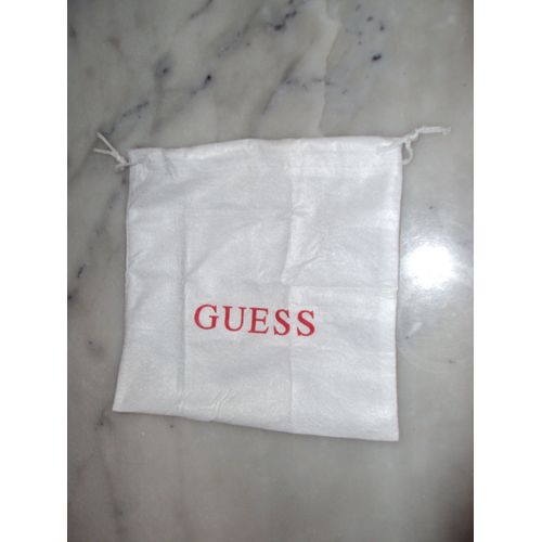 4 housses de protection neuves "Guess"