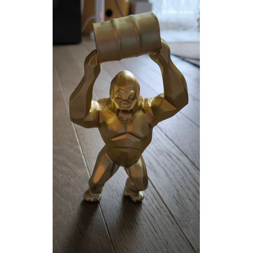 Sculpture en résine d'un Kong doré neuf