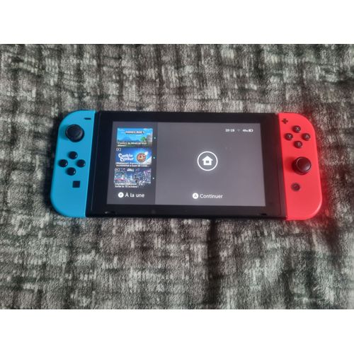 Pack Nintendo Switch V1 + Joy-Con + 5 Jeux + Steelbook + Valise