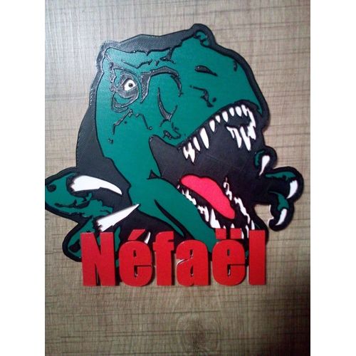plaque de porte décorative sur le theme des dinosaures avec prénom