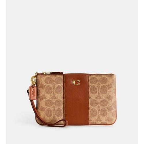 Coach - Pochette Small Wrislet toile monogramme et cuir - Beige