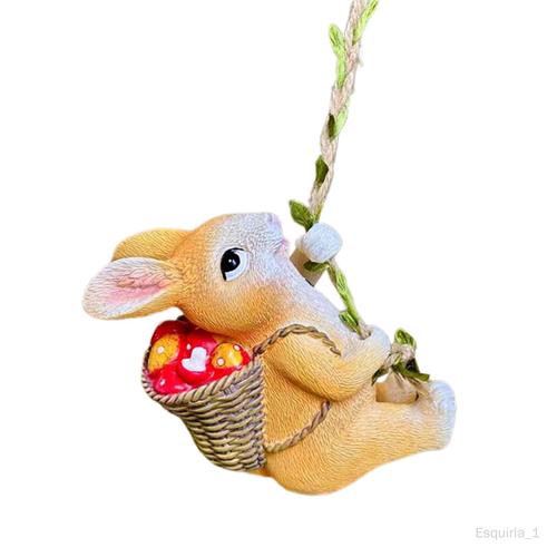 Figurine de lapin grimpant avec les mains accrochées à une corde, décoration