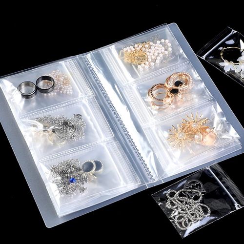 Kyaoayo-Sac De Rangement Pour Bijoux Livre De Rangement Portable Pour Boucles D'oreilles De Voyage Pochettes À Bijoux Pour Stocker Des Bijoux Pour Bijoux, Colliers, Bagues(84 Grilles + 30 Pochettes)