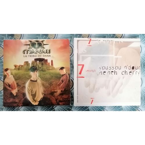 Lot De 2 Cds, Manau: La Tribu De Dana / L'avenir Est Un Long Passé. Youssou N'dour: 7 Seconds/ Mame Bamba