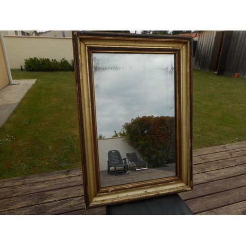 Miroir mural ancien en bois doré