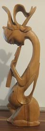 Sculture en bois joueur de flute asiatique