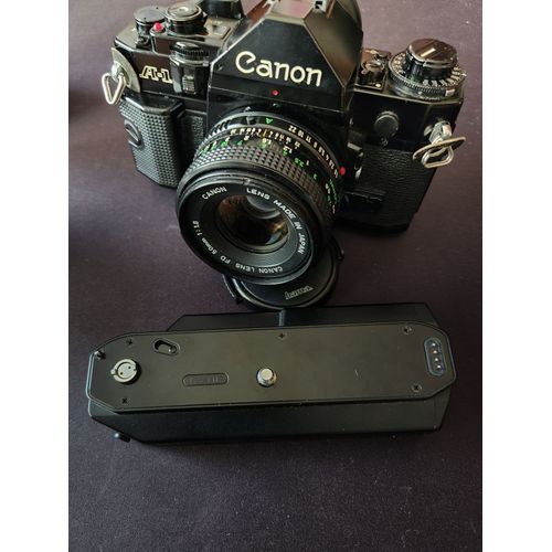 Appareil photo Canon A1, moteur, objectifs et flash