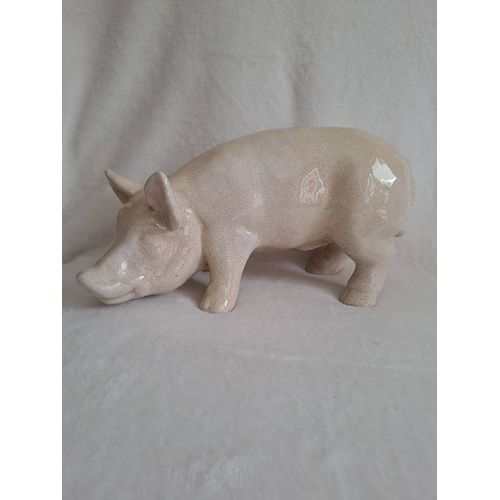 Cochon en céramique craquelée. 31 cm x 16 cm.
